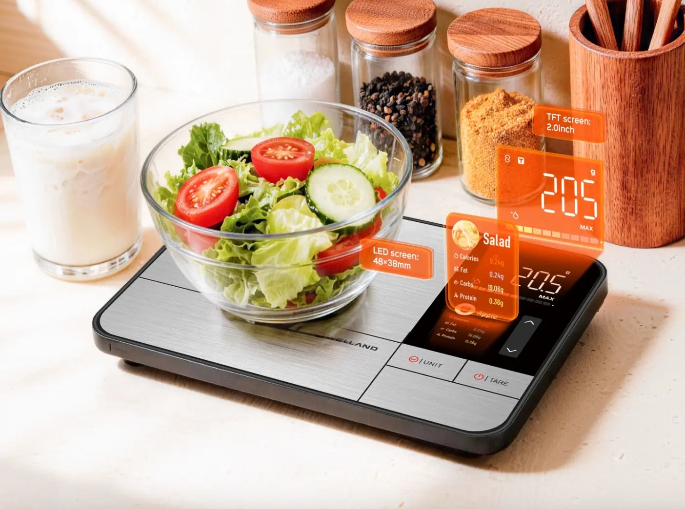 SyncBody Kitchen weighing a bowl of salad, showing weight and nutrition on two screens
