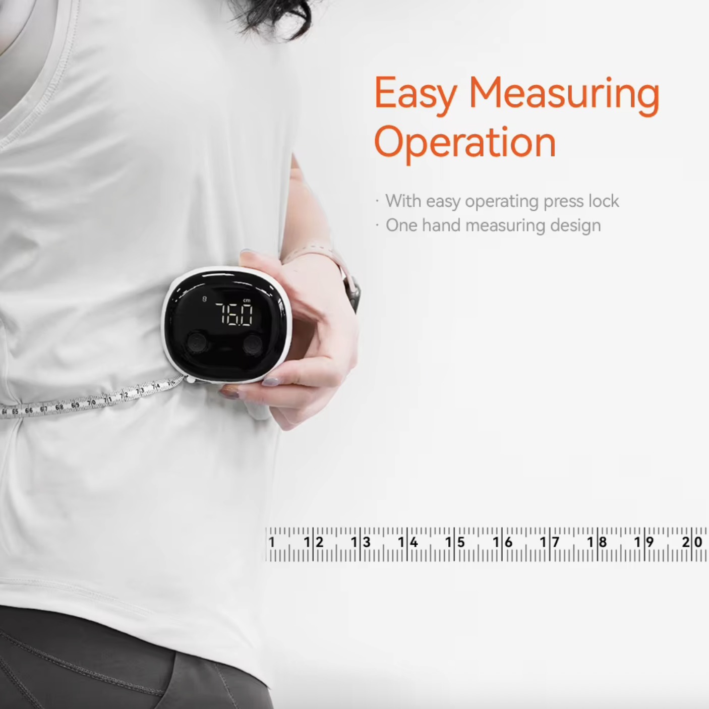 Measuring a waist one-handed with the tape's press lock